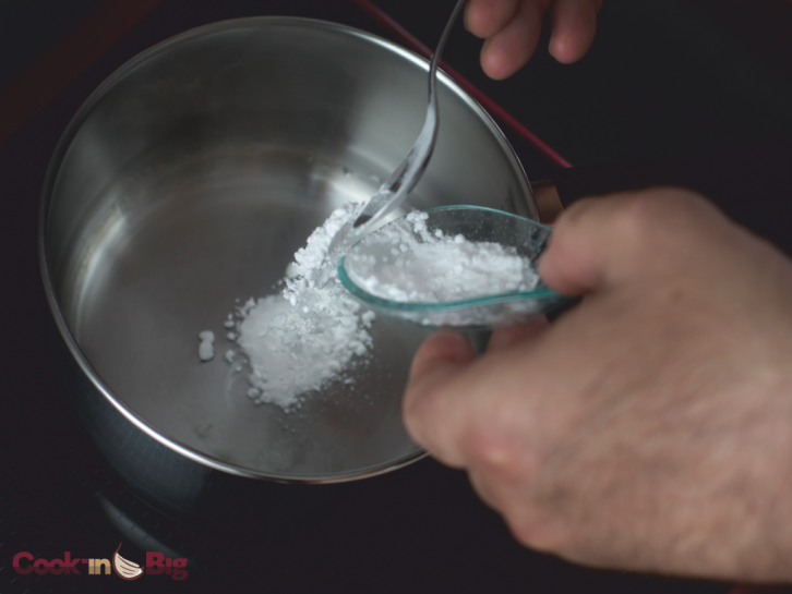 Place the mannitol powder in a saucepan over a medium heat and wait for it to turn liquid