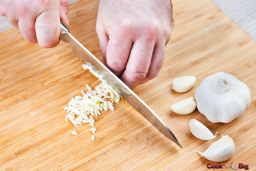 Finely chop the garlic cloves