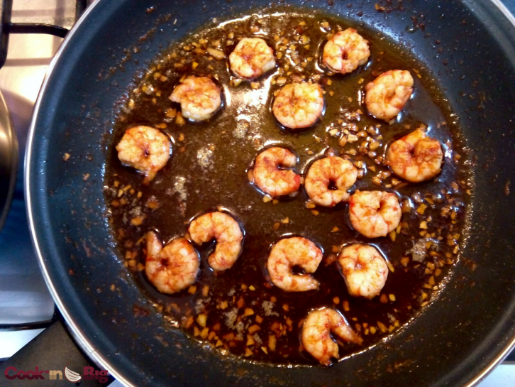 Fry the prawns with oil along with the crushed garlic