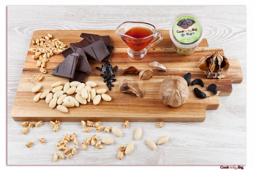 Crunchy Cocoa Bars with Almonds, Puffed Rice and Black Garlic.